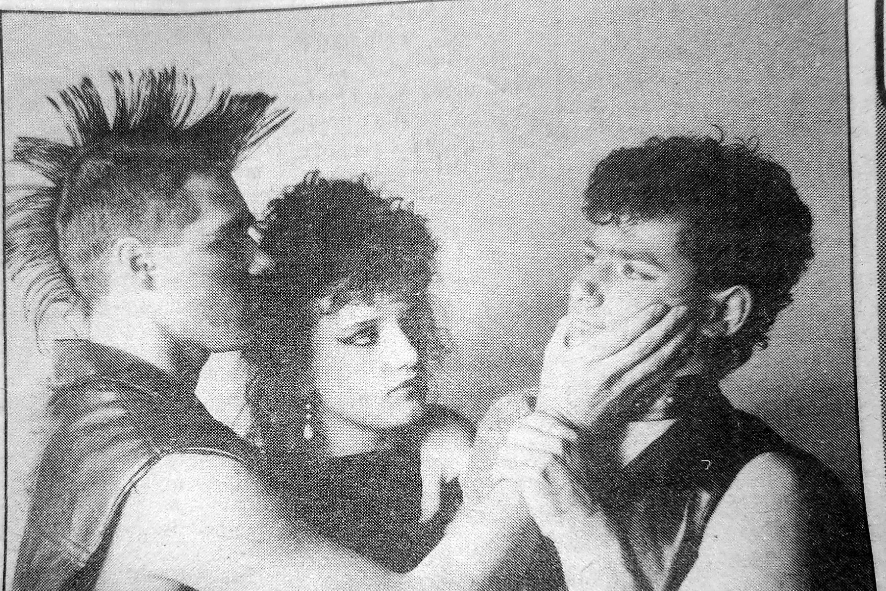 Restored 1985 newspaper photograph of Mark Hammat, Nicola Schultz and Steve Turner performing in Regardless